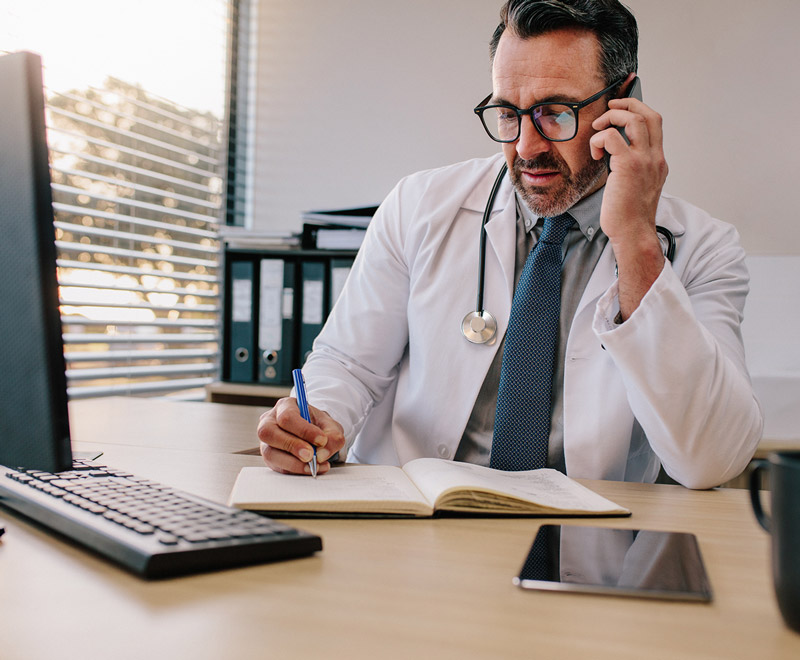 doctor is talking on the phone